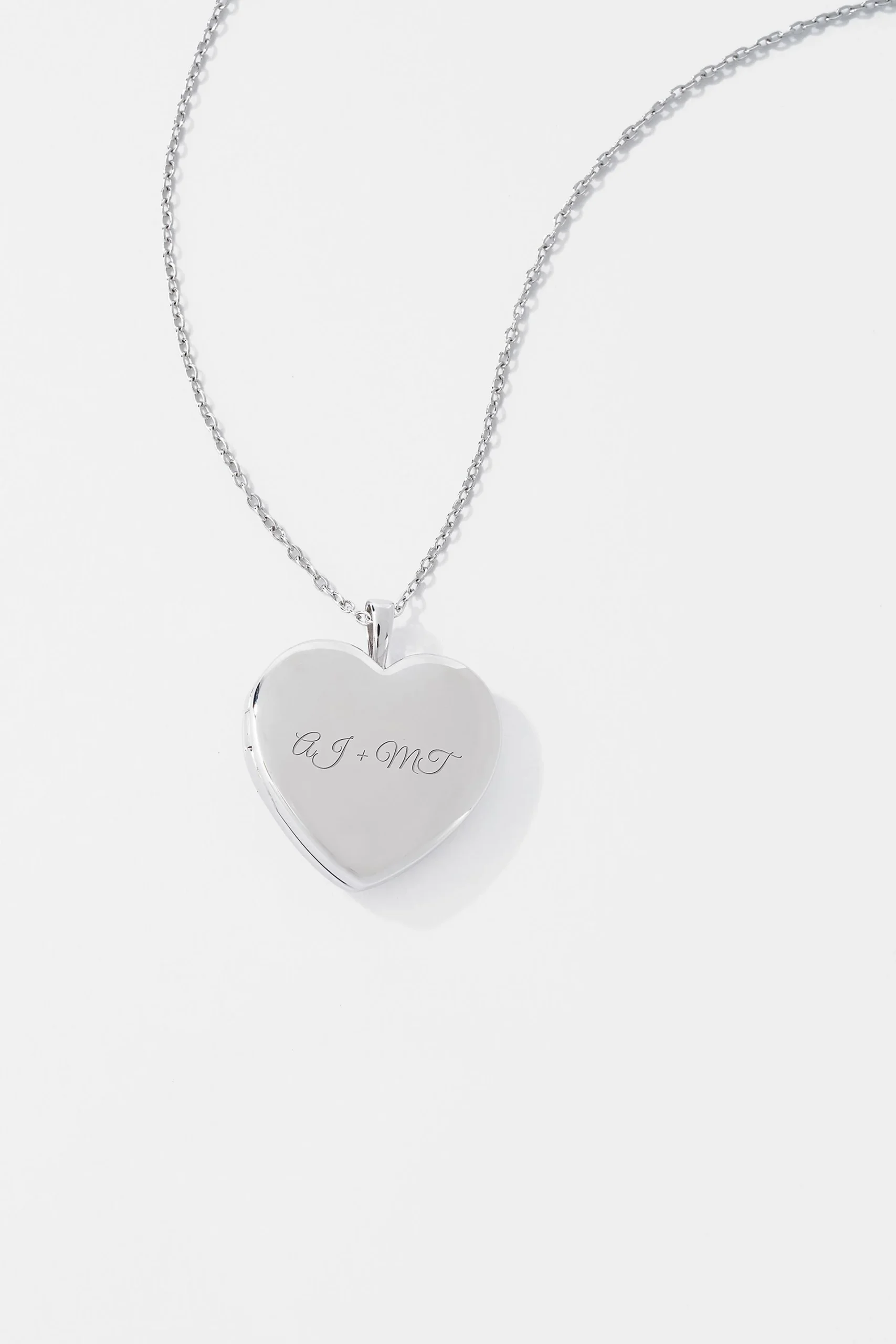 Kittenish Engraved Sterling Silver Heart Locket